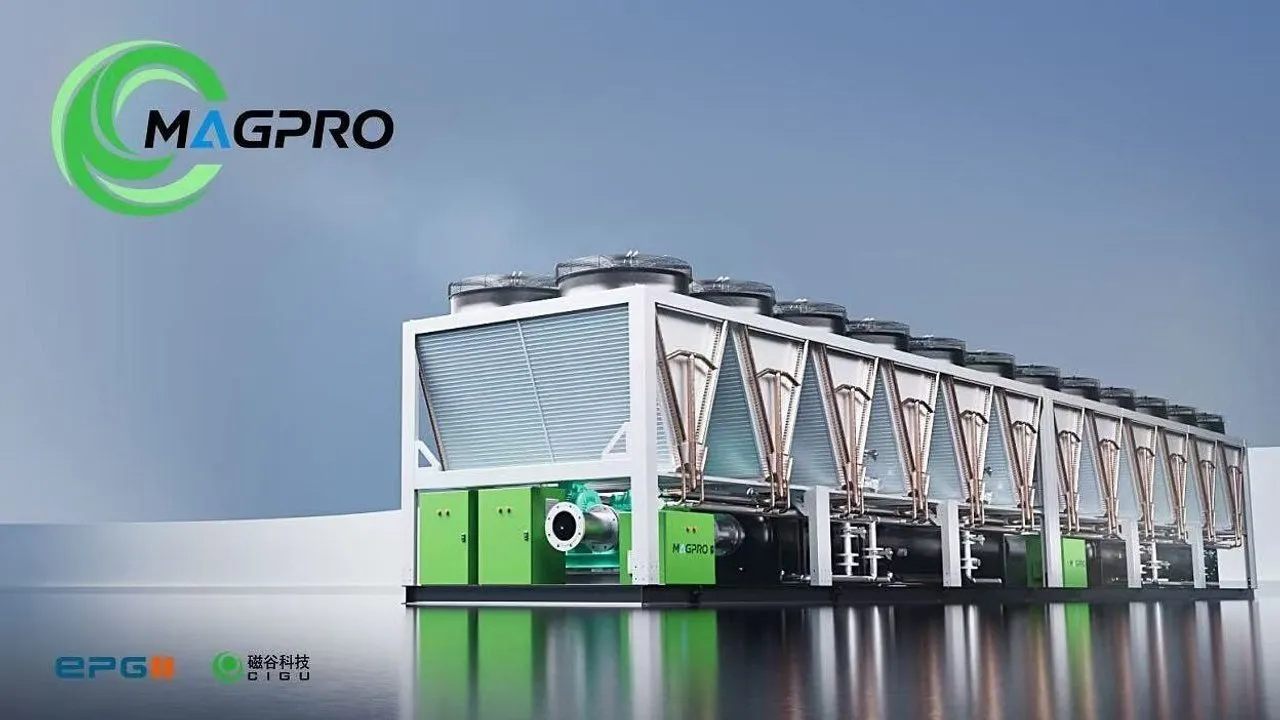 Industrial cooling unit with multiple fans, pipes and green control panels.